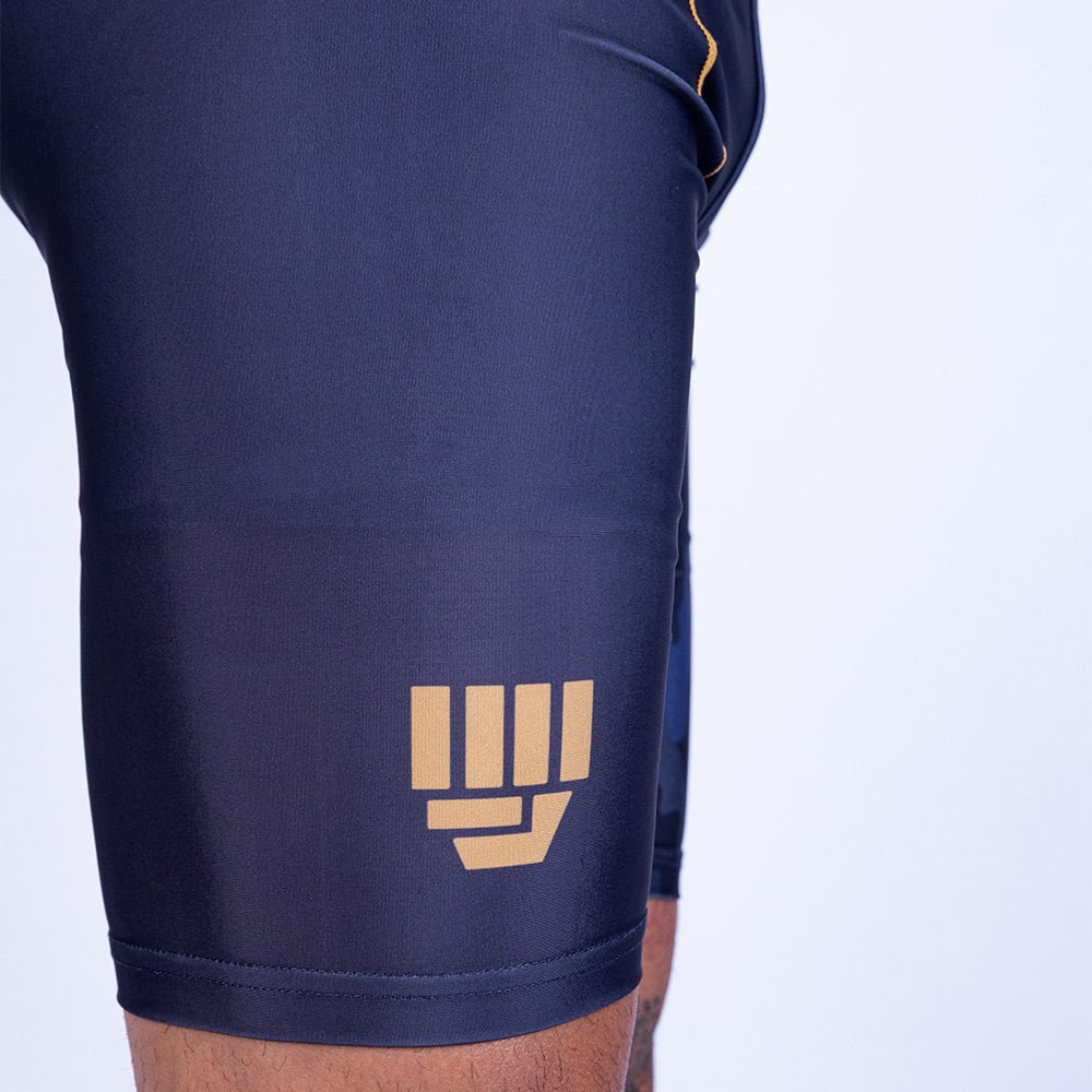 Pantaloneta de MMA Uppercut negro/dorado